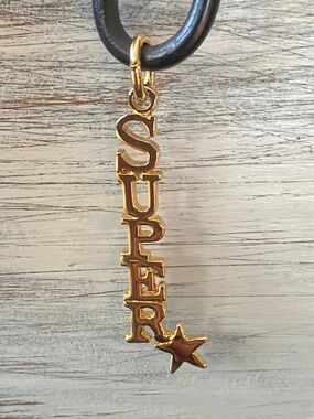Gold SUPERSTAR Word Pendant